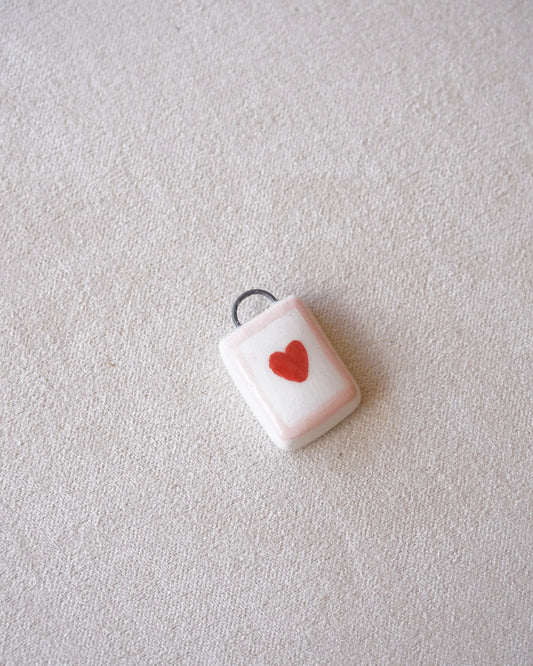 CIONDOLO CUORE E CONTORNO ROSA-PREORDINE