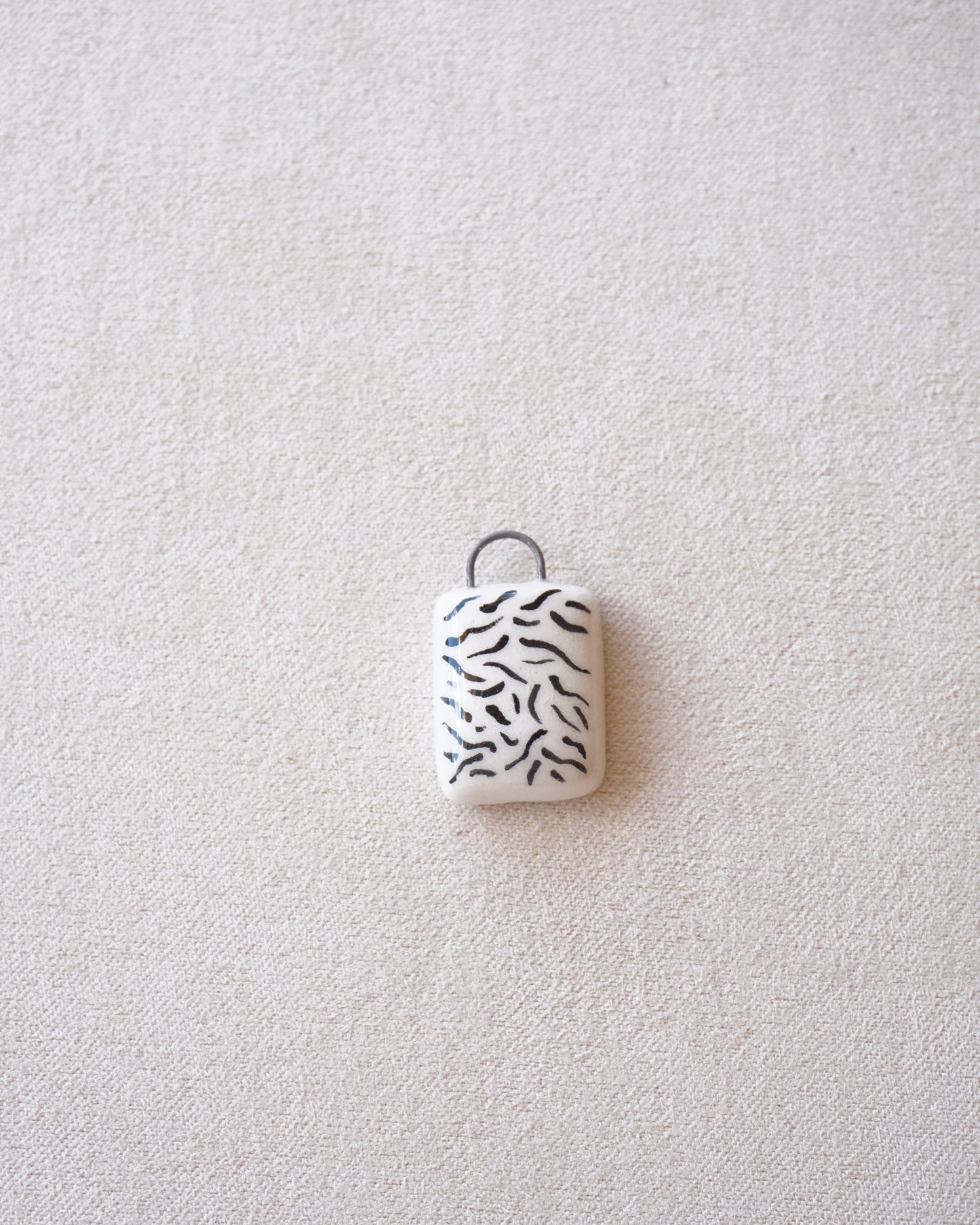 CIONDOLO ZEBRATO-PREORDINE