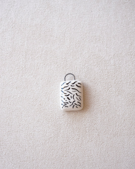 CIONDOLO ZEBRATO-PREORDINE