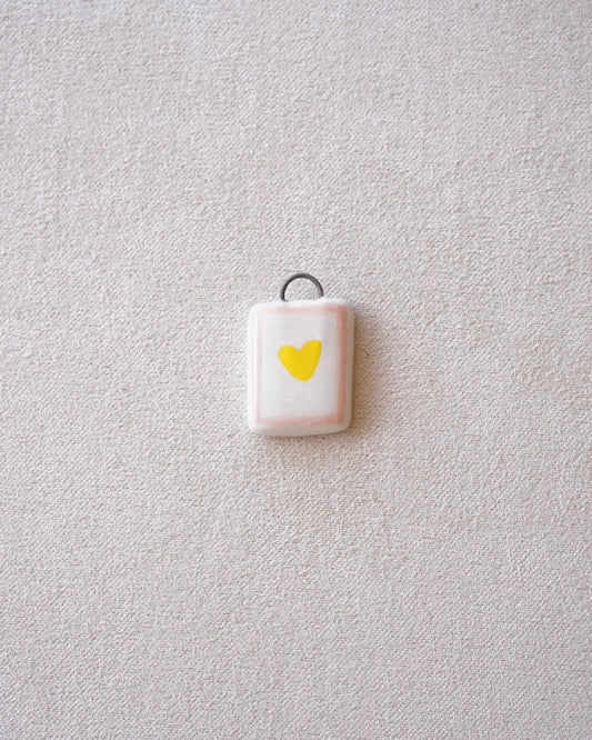 CIONDOLO CUORE GIALLO-PREORDINE