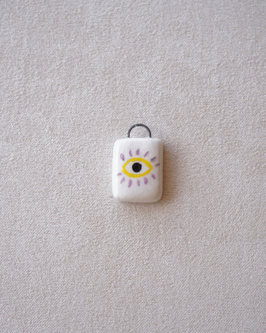 CIONDOLO OCCHIO GIALLO E VIOLA-PREORDINE