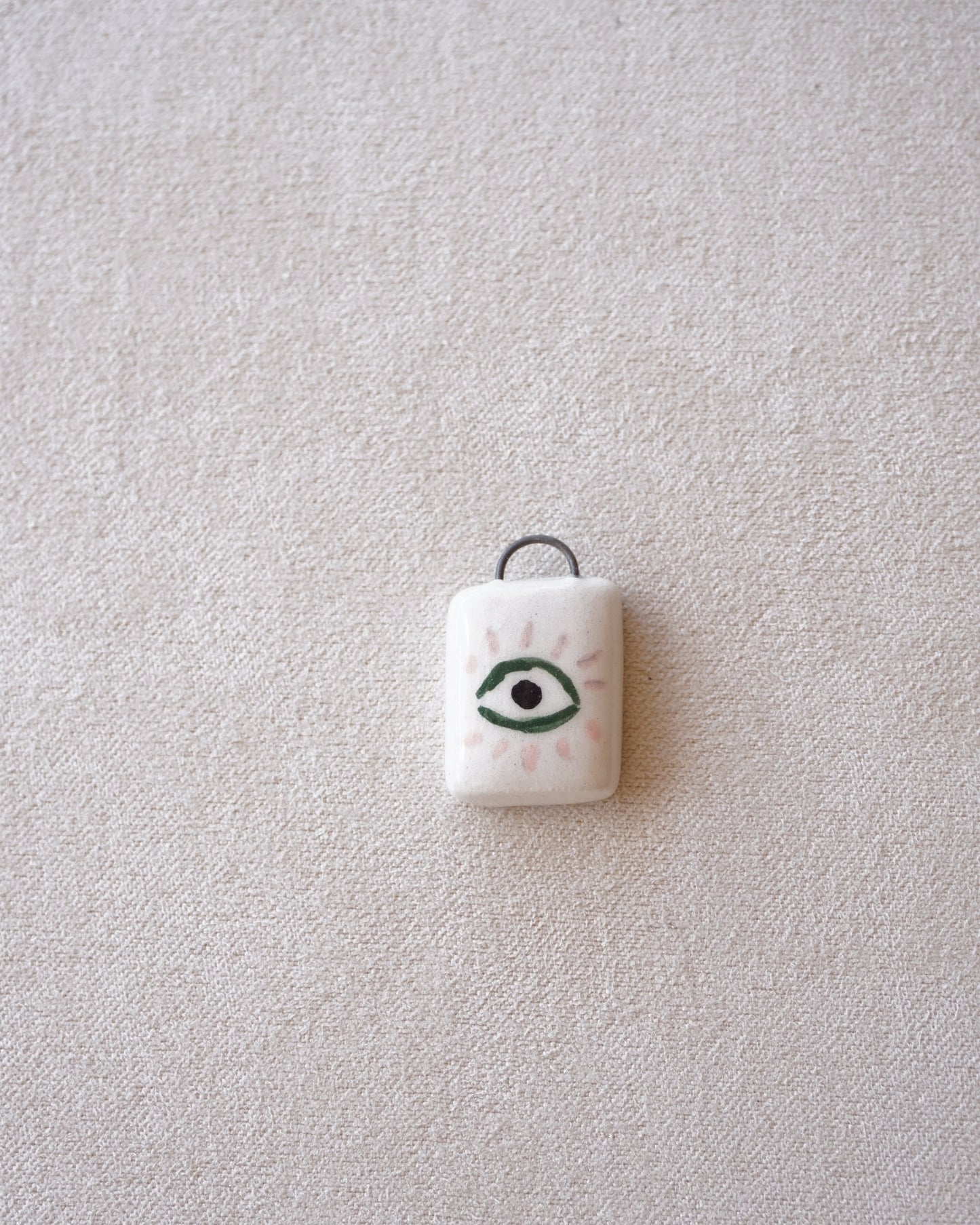 CIONDOLO OCCHIO ROSA E VERDE-PREORDINE