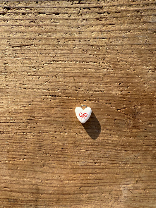 Ciondolo cuore fiocco rosso
