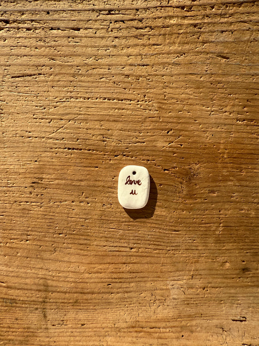 Ciondolo love u marrone